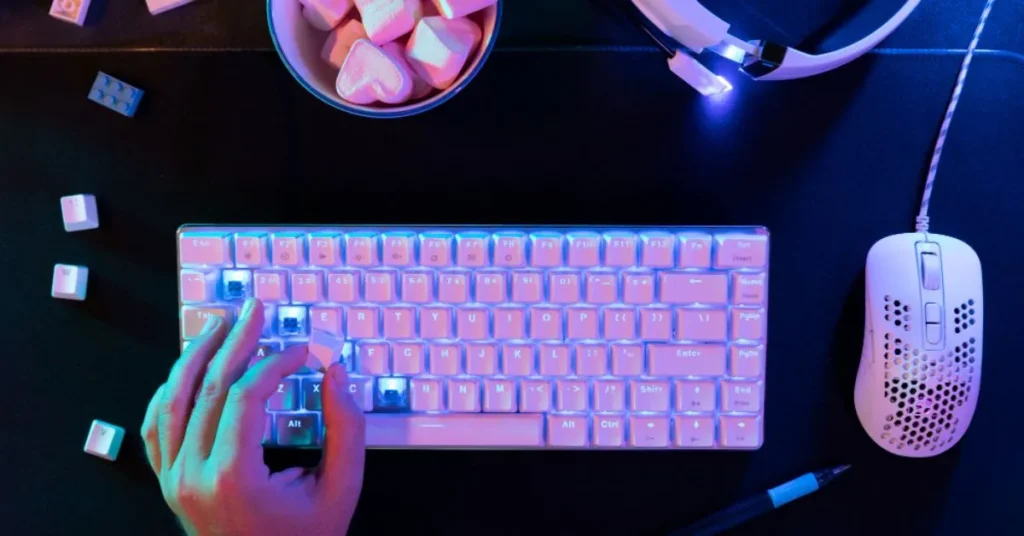 Logitech G705 gaming mouse on modern desktop setup designed for small hands